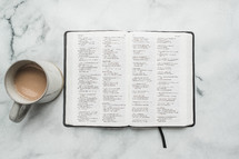 overhead view, coffee mug and opened Bible