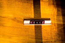 word peace in scrabble pieces 