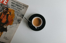 magazine and coffee cup 