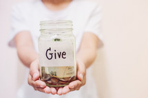 cupped hands holding a giving jar 