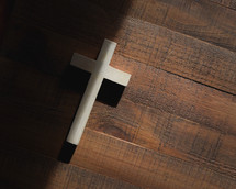 cross on a wood floor 