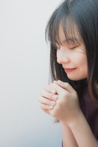 young woman praying 
