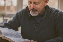A man reading his Bible