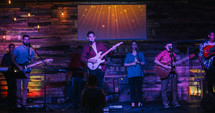 musicians on stage at a worship service 