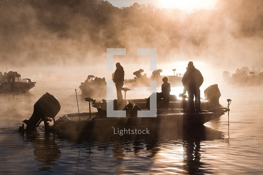 Fisherman assemble on a foggy Fall morning at sunrise on Lake Tillery, North Carolina, at the Swift Island Access Ramp, to receive instructions for the competition. Part of the Uwharrie National Forest.
