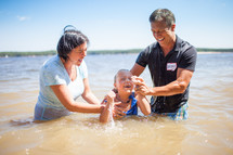 a child baptism in water 
