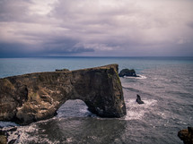 arch rock formation in the ocean 