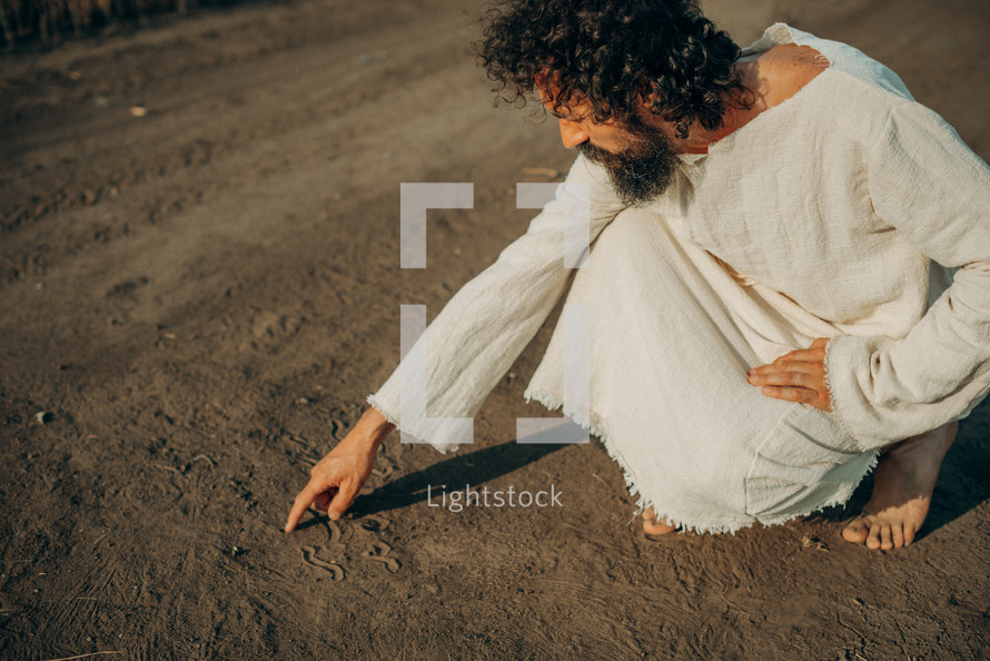 Divine Script: Jesus' Finger in the Sand