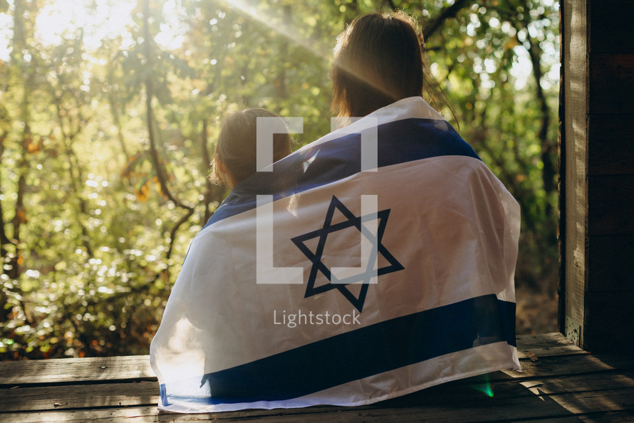 Sisterly Serenity: Embracing Israel's Flag Together