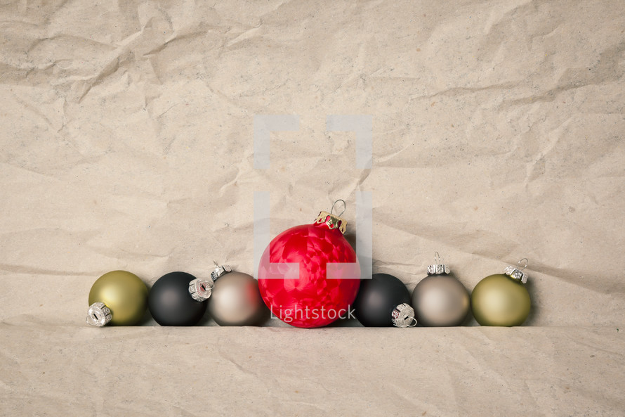 Christmas ornaments on crumpled paper 