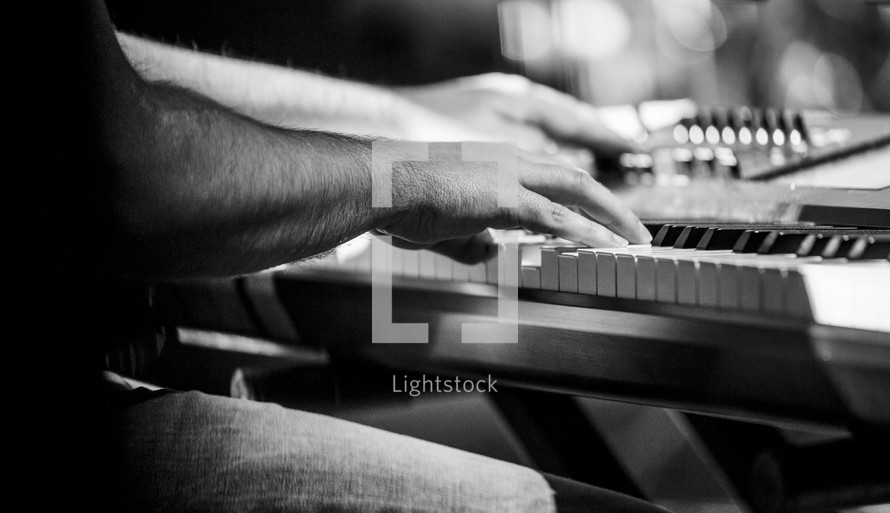 a musician playing an electric piano 