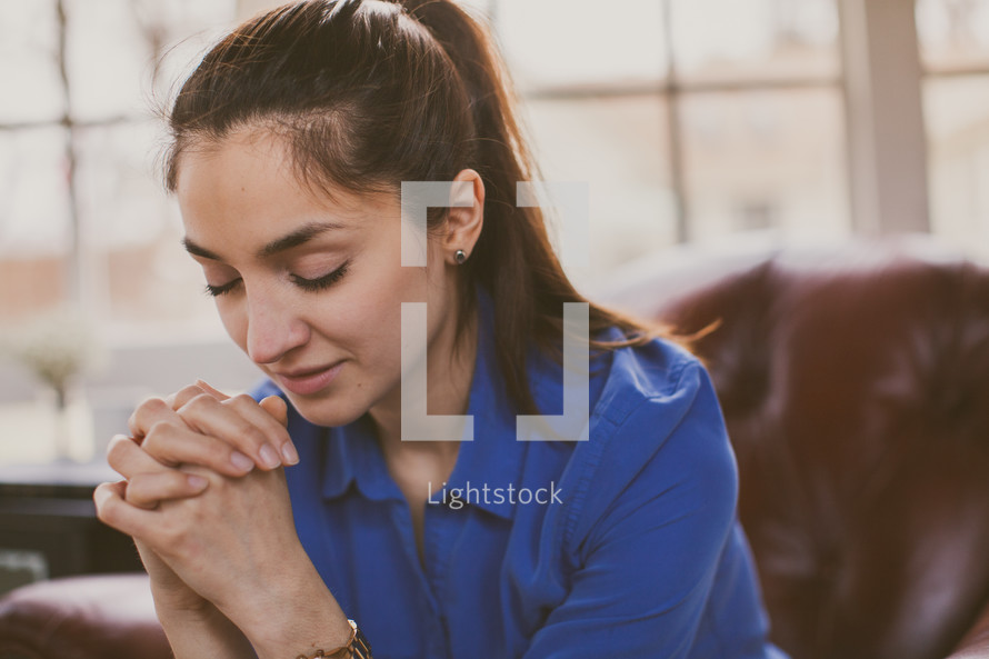A woman in prayer 