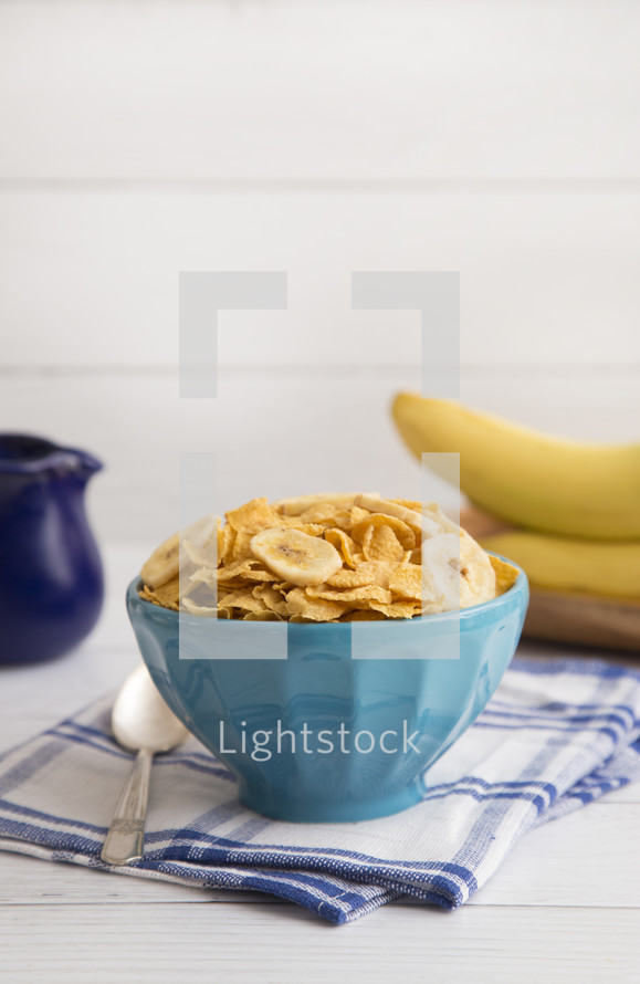 Breakfast Cereal and Bananas in a Blue Bowl