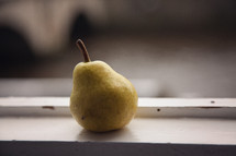 pear in a window sill 