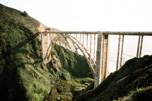 tall bridge between a deep valley ravine