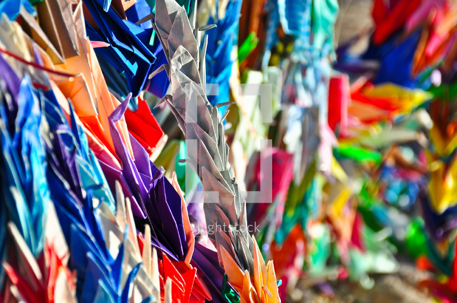 thousands of paper cranes 