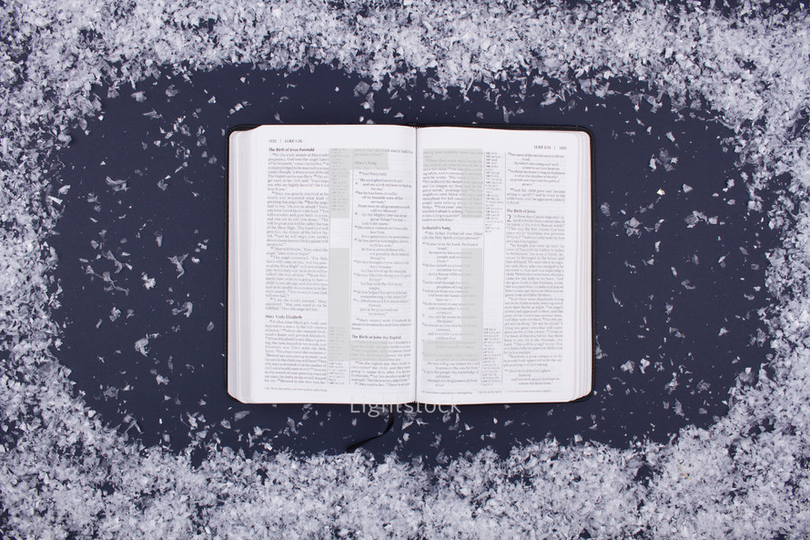 open Bible and snow border 