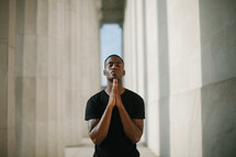African American man in prayer