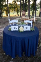 Mr and Mrs table at a wedding reception 