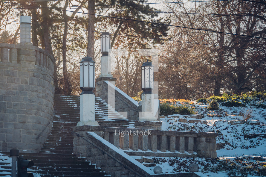 snow on stone steps 