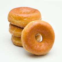 stacked donuts on a white background 