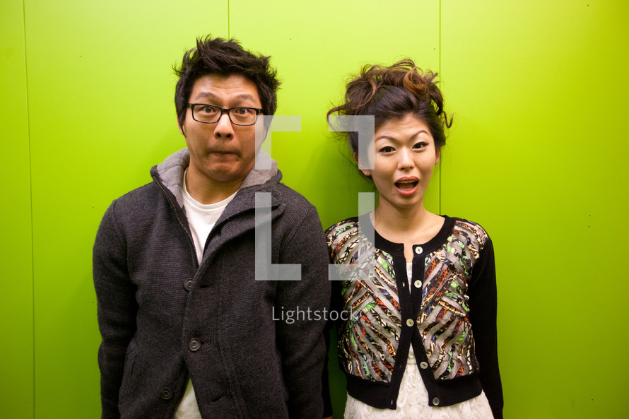shocked Asian couple 