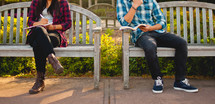 teens studying on benches 