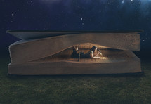 Woman pitching a tent in the Bible, reading scripture by flashlight at night.