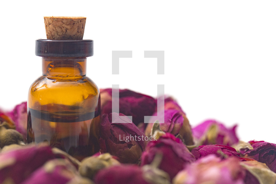 Rose Essential Oil in a Rustic Corked Bottle