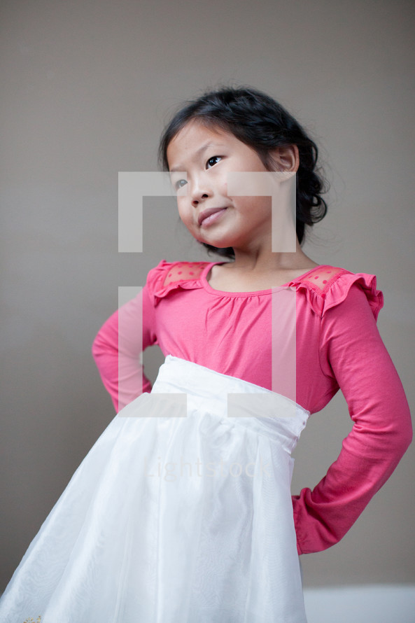 young Asian girl child in a dress 