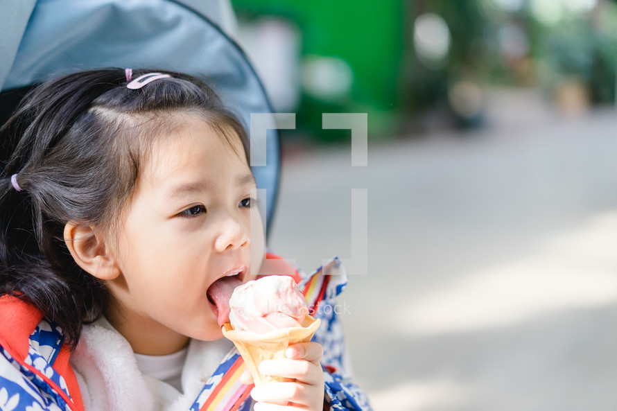 kid eating an ice cream cone
