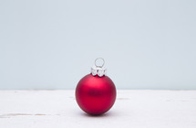 single red ball ornament