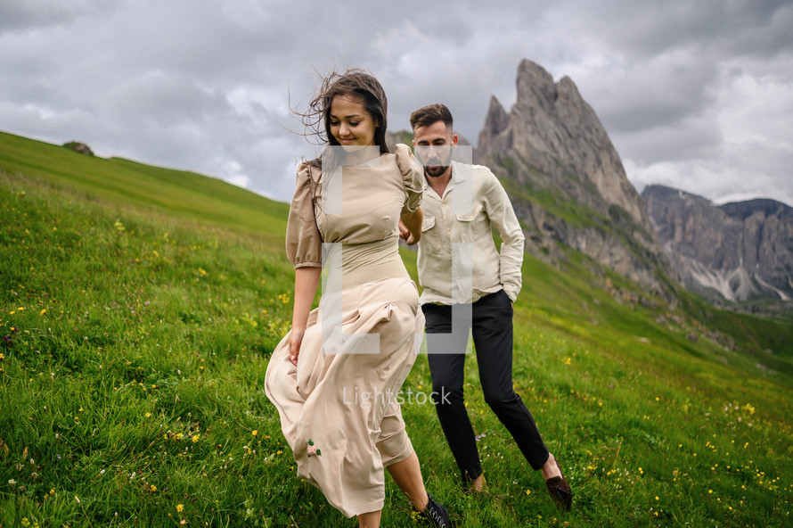 engagement portrait on the side of a mountain 