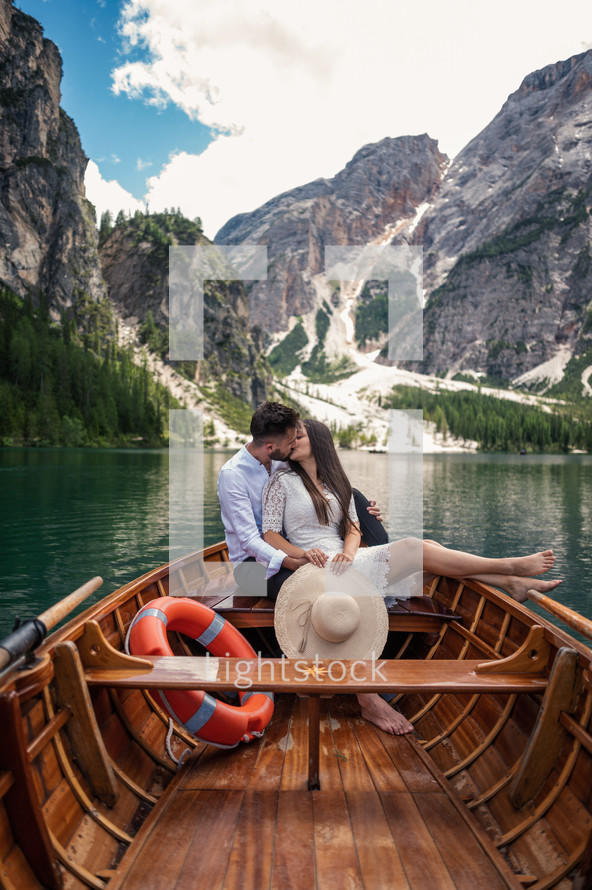 a couple on a rowboat 