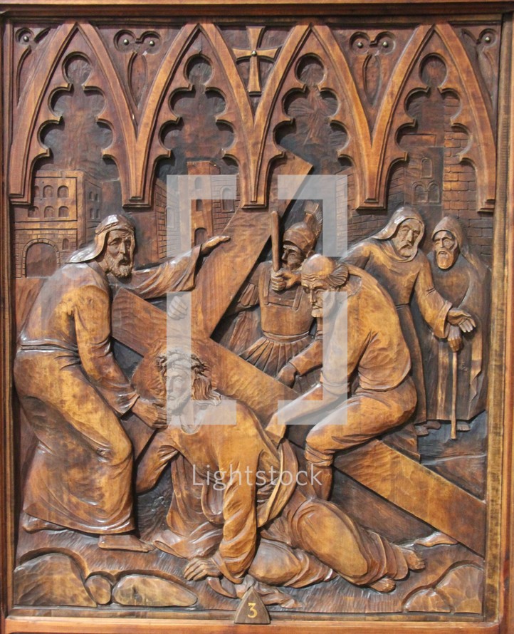 wooden carving, stations of the cross 3 - Jesus falls the first time 