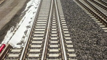 snow along train tracks 