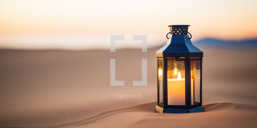 Lantern in the desert at sunset. Ramadan Kareem concept.