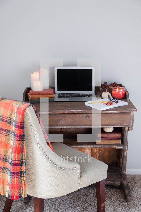 laptop computer on a desk in a home office in fall 