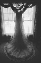 wedding dress in a window 