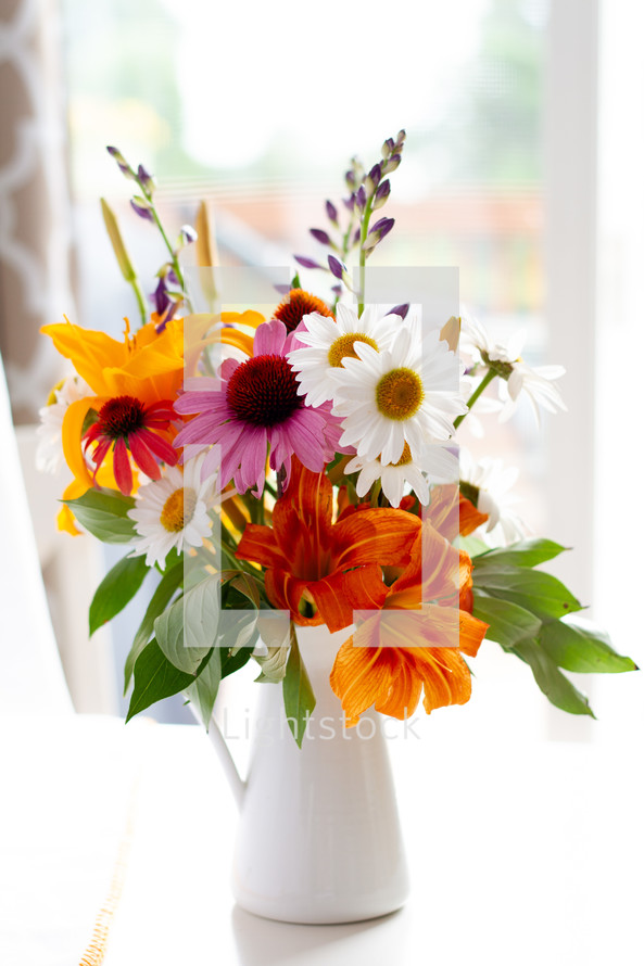 vase of cut summer flowers 