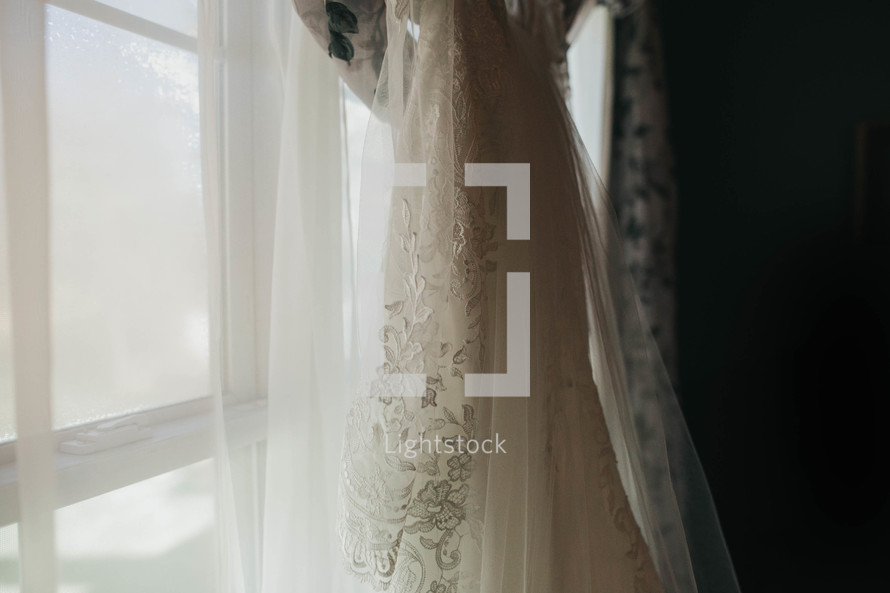 wedding gown in a window 