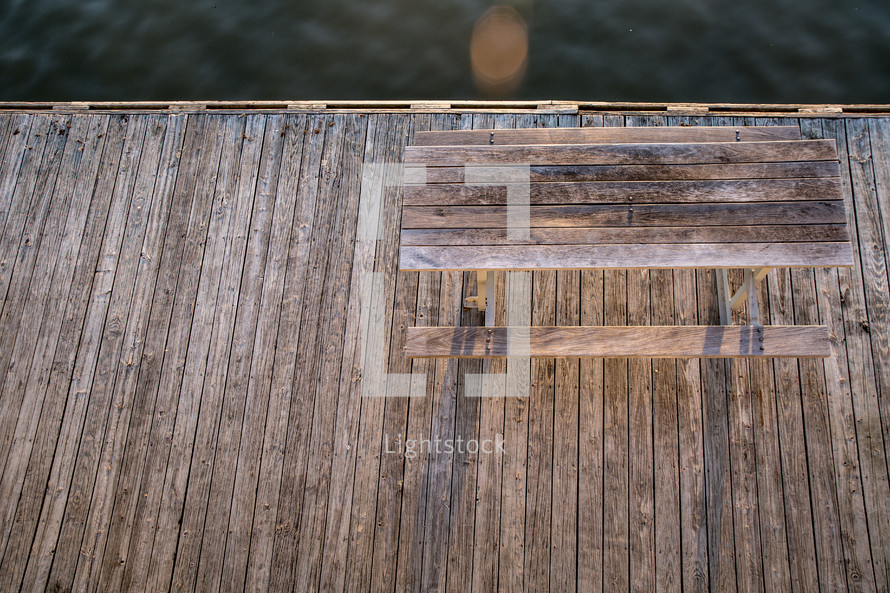 picnic table on a dock 