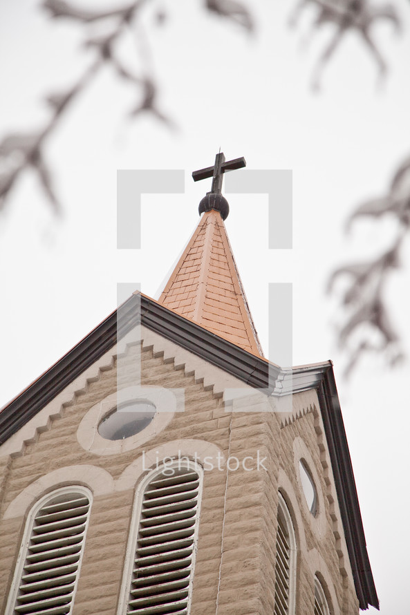 cross topper on a church steeple