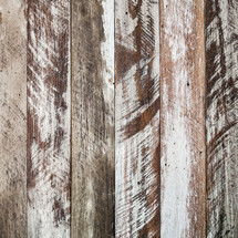 scratched and weathered wood boards background 