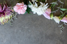 pink and white flowers on gray background 