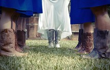 bride and bridesmaid in cowboy boots 