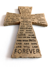 Cross of Christ with faith, love, hope, trust, believes, protects, words from the bible of hope, faith and love that will last. 