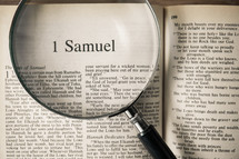 magnifying glass over Bible - 1 Samuel 