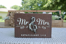 Mr and Mrs sign 