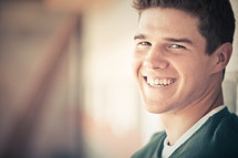 Smiling portrait of a handsome teenage boy. 